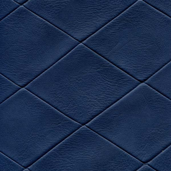 Conterpane Navy fabric swatch: Deep blue diamond-tufted leatherette upholstery.