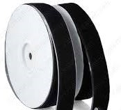 Black 1" wide velvet adhesive loop tape on spool, for crafting & DIY projects.