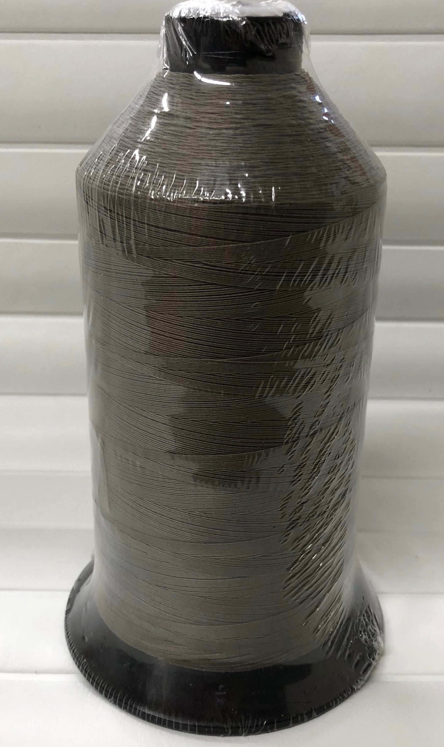 Sunguard B92 Beaver 229Q 16oz thread spool, dark brown, plastic wrapped.