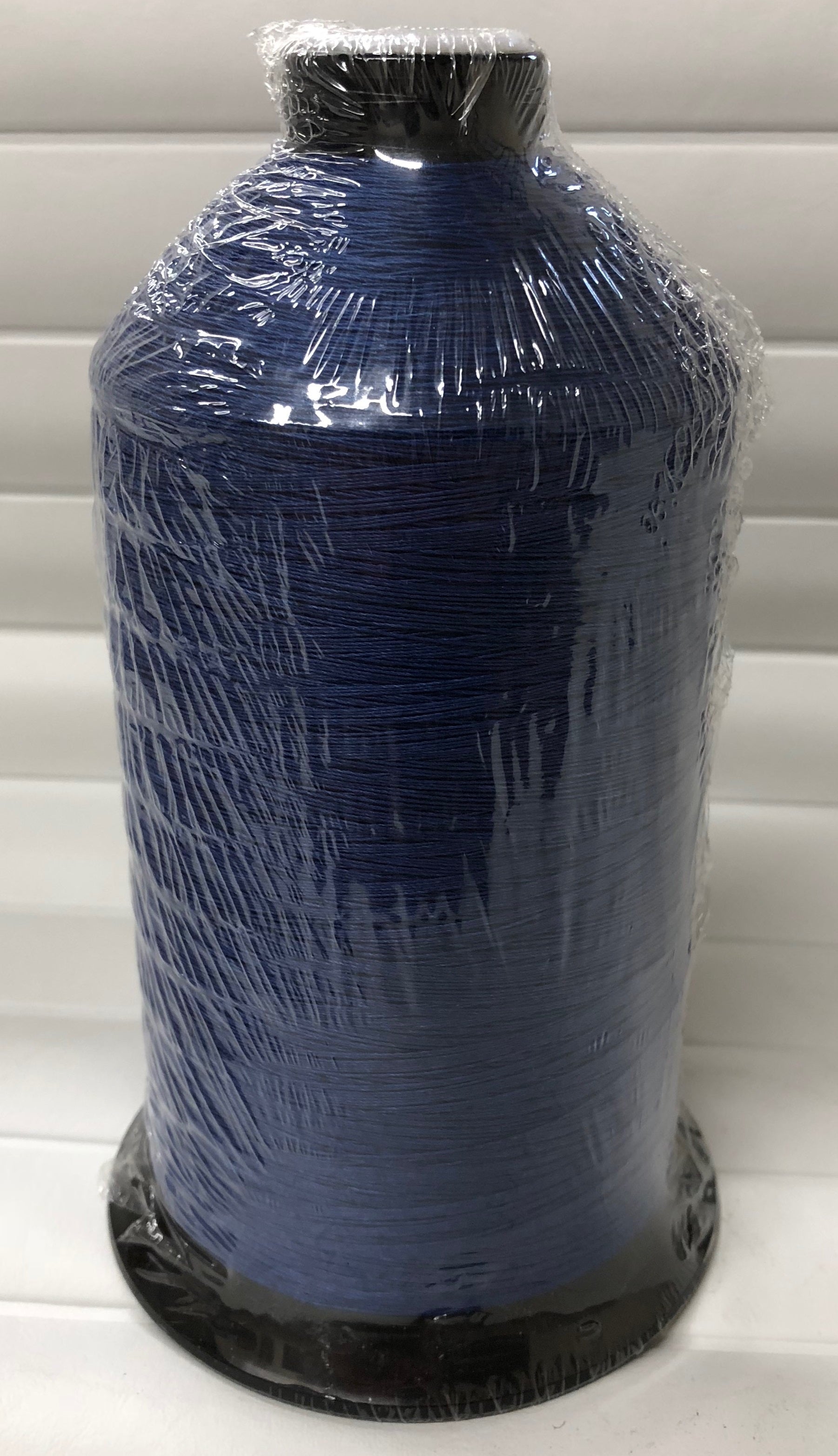 Sunguard B92 Mediterranean 225Q 16oz thread spool, dark blue, plastic wrapped.