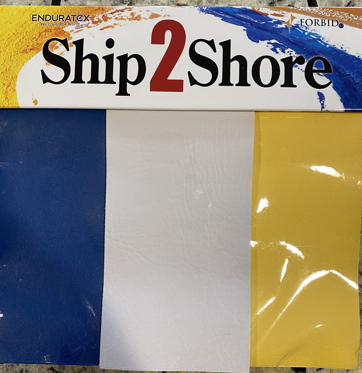 Enduratex Ship2Shore sample book: blue, white, and yellow vinyl swatches.