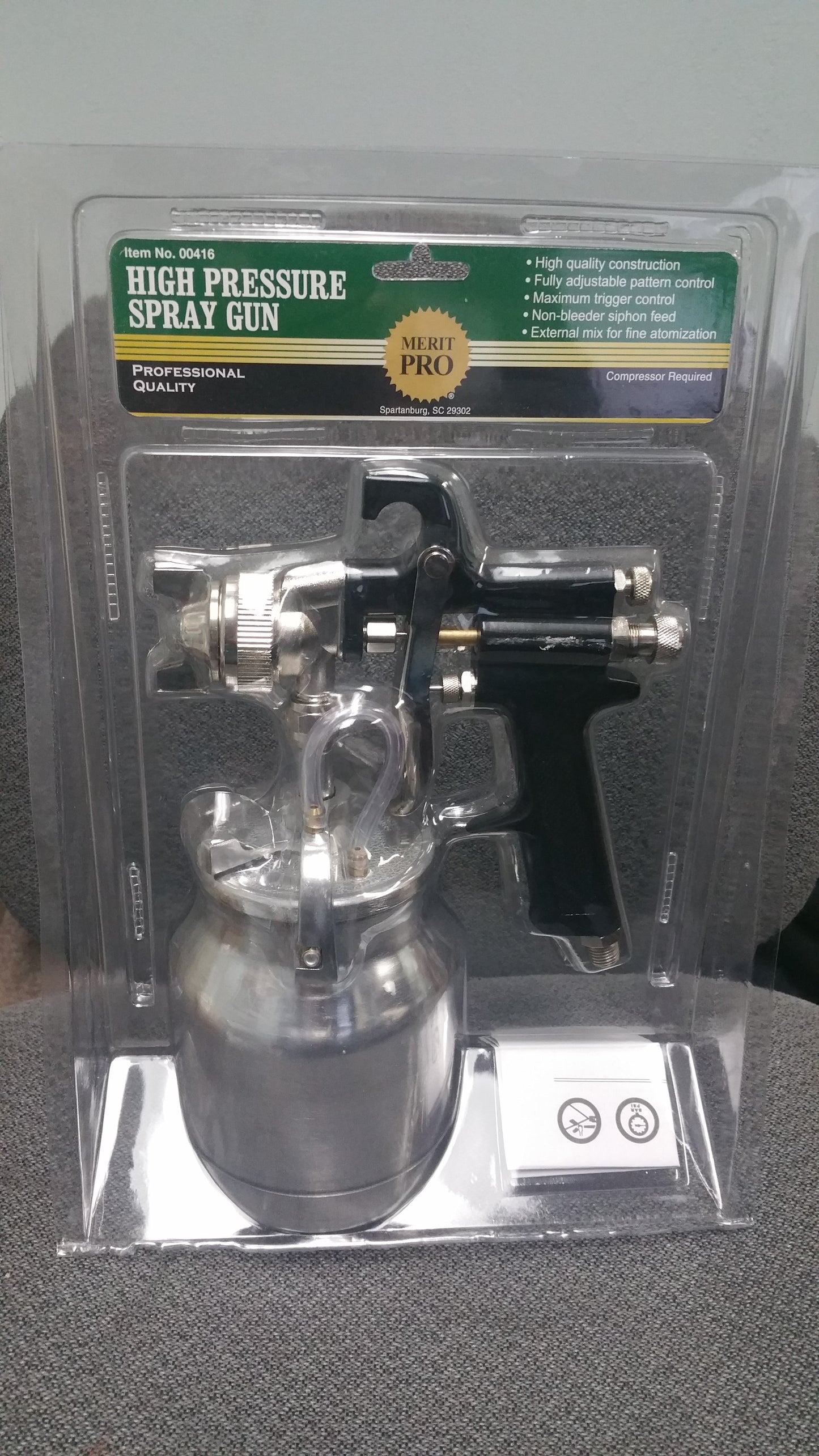 Merit Pro High Pressure Spray Gun with adjustable pattern control, non-bleeder siphon feed, and external mix for fine atomization. Compressor required.