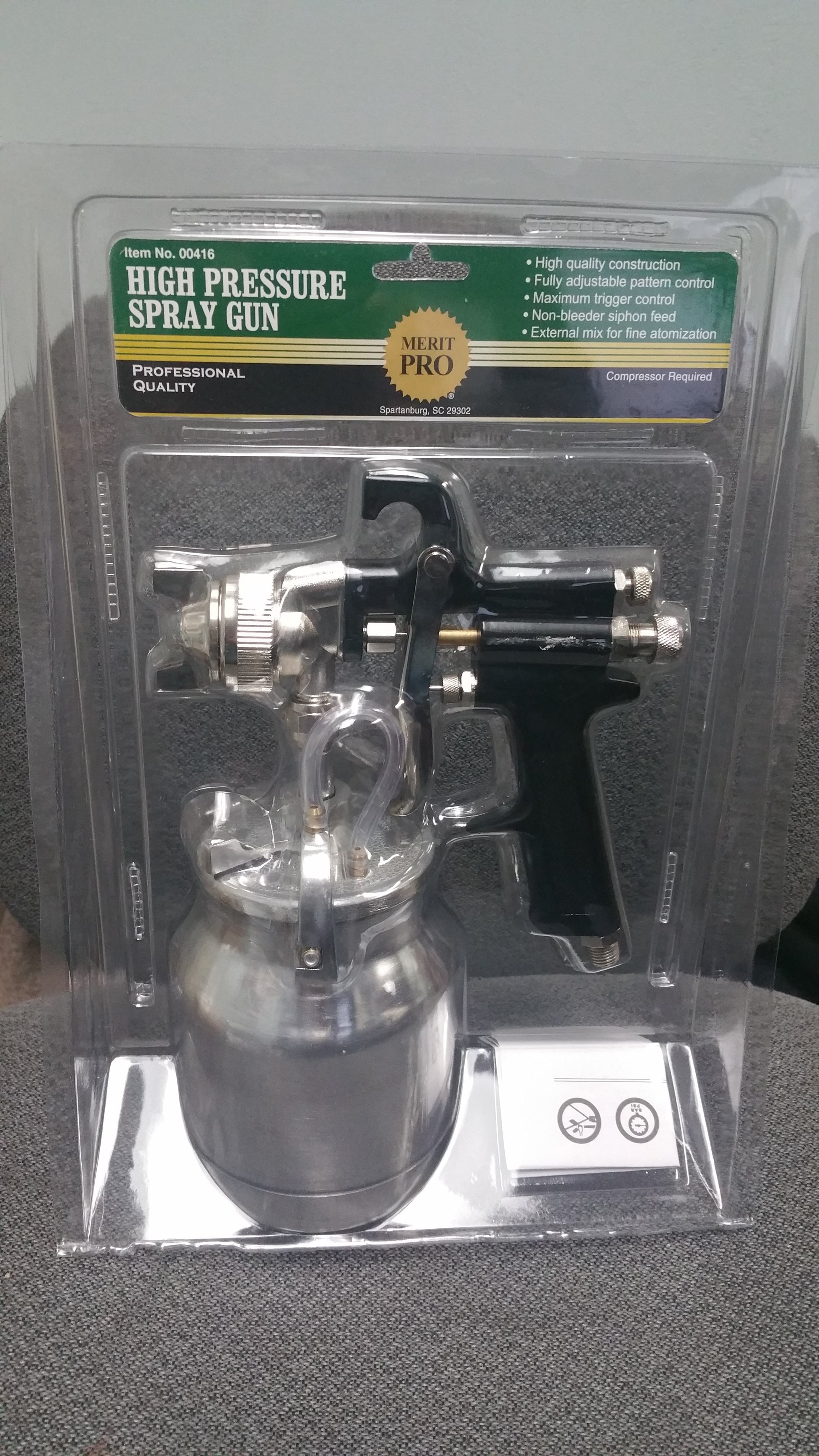 Merit Pro High Pressure Spray Gun with adjustable pattern control, non-bleeder siphon feed, and external mix for fine atomization. Compressor required.