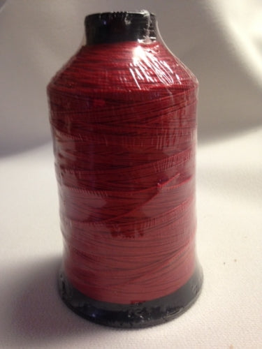 T-270 Vinyl 707Q Scarlet Contrast Thread: Red vinyl thread spool for sewing.