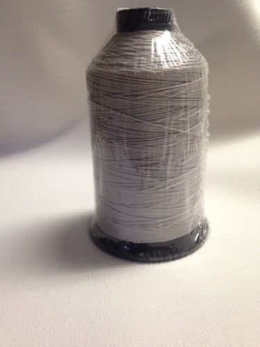 T-270 Nylon 720Q Nickel Contrast Thread spool, light grey, for sewing projects.
