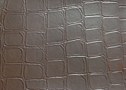 Alligator Chocolate Vinyl: Brown embossed vinyl with crocodile texture.
