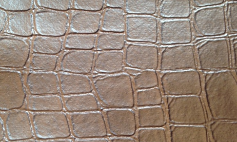 Alligator Furniture Vinyl Cabrenet: Brown croc-embossed vinyl upholstery texture.