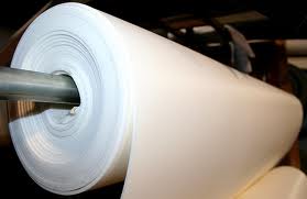 Large roll of 1/8" thick closed-cell white foam sheet.