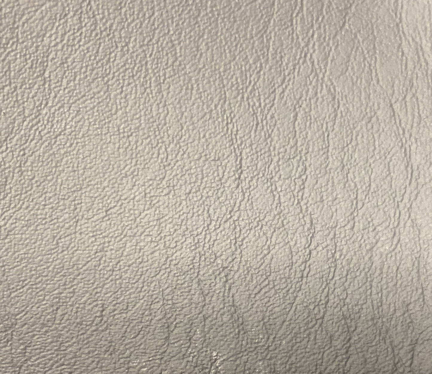 L7035 Original Vinyl: Light gray textured vinyl upholstery fabric.