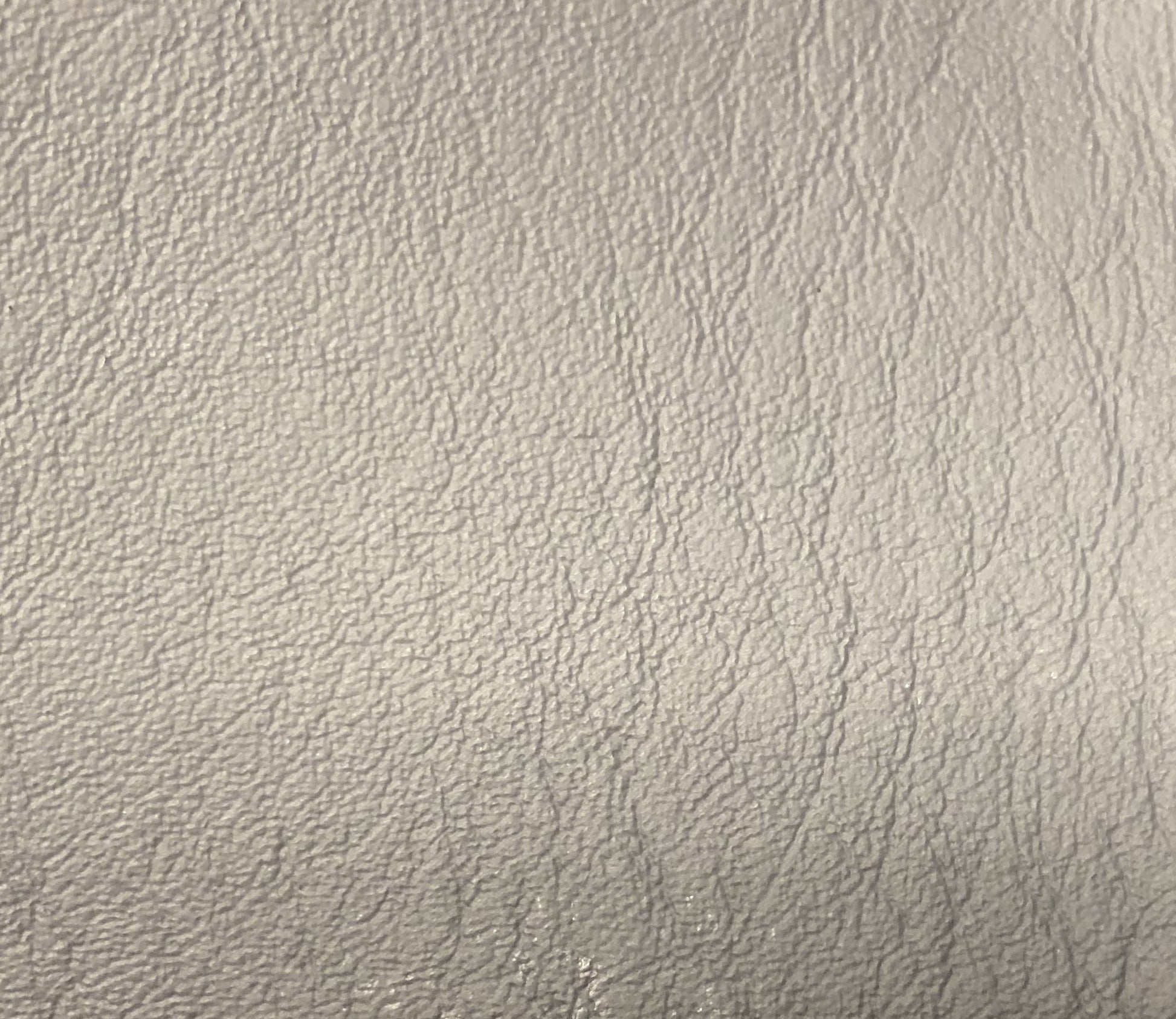 L7035 Original Vinyl: Light gray textured vinyl upholstery fabric.