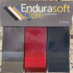 Endurasoft Core by Enduratex: durable fabric samples in gray, red, and navy with textured surfaces.