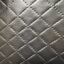 Black VLD49 Denali quilted vinyl with diamond stitching.