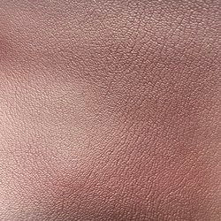 L7125 Original Automotive Vinyl: Rose-toned textured vinyl for upholstery and auto interiors.
