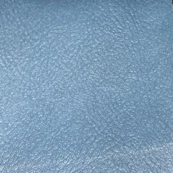 Madrid Md Blue textured vinyl upholstery fabric in a light blue shade.