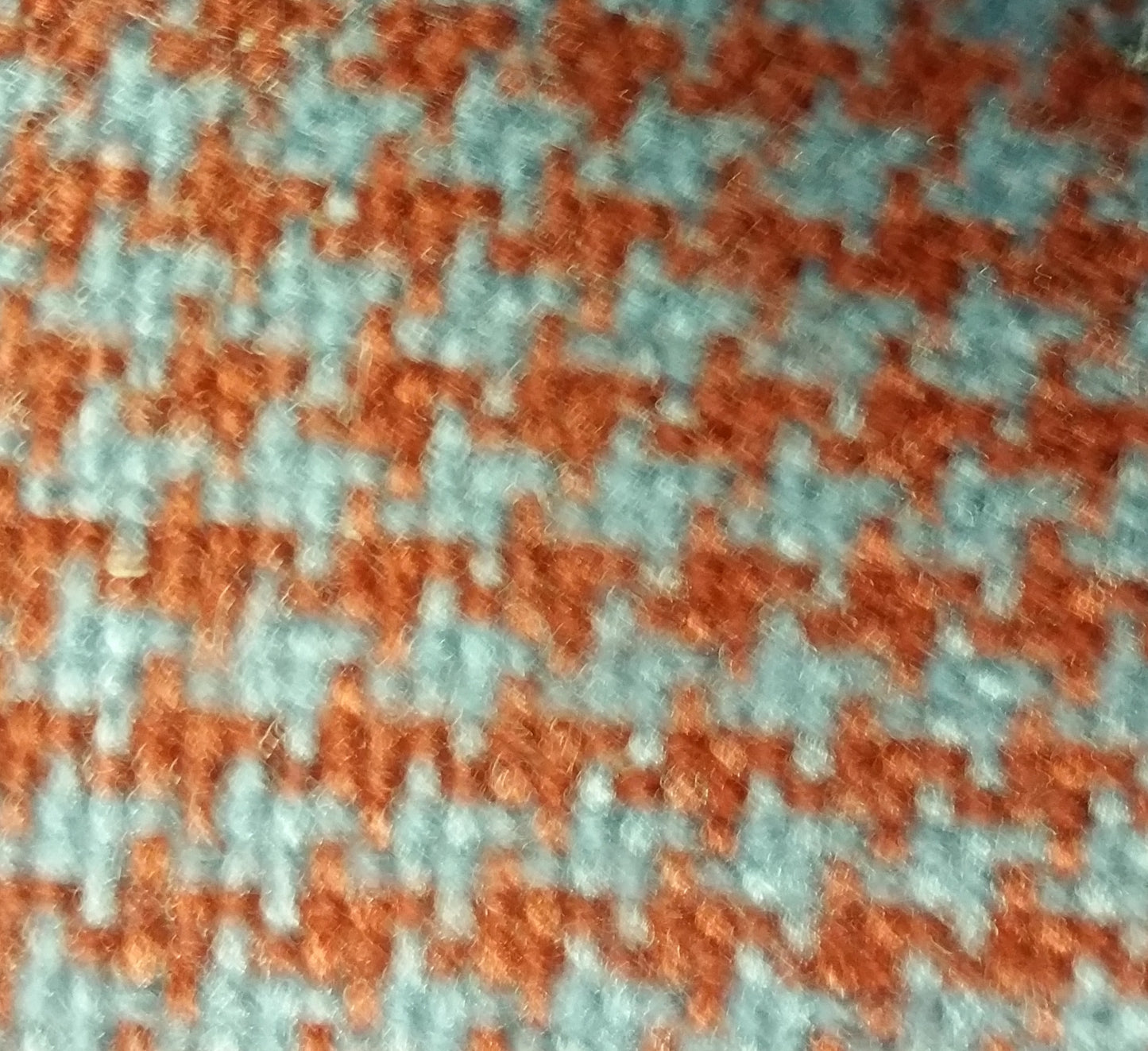 Rust blue houndstooth fabric swatch