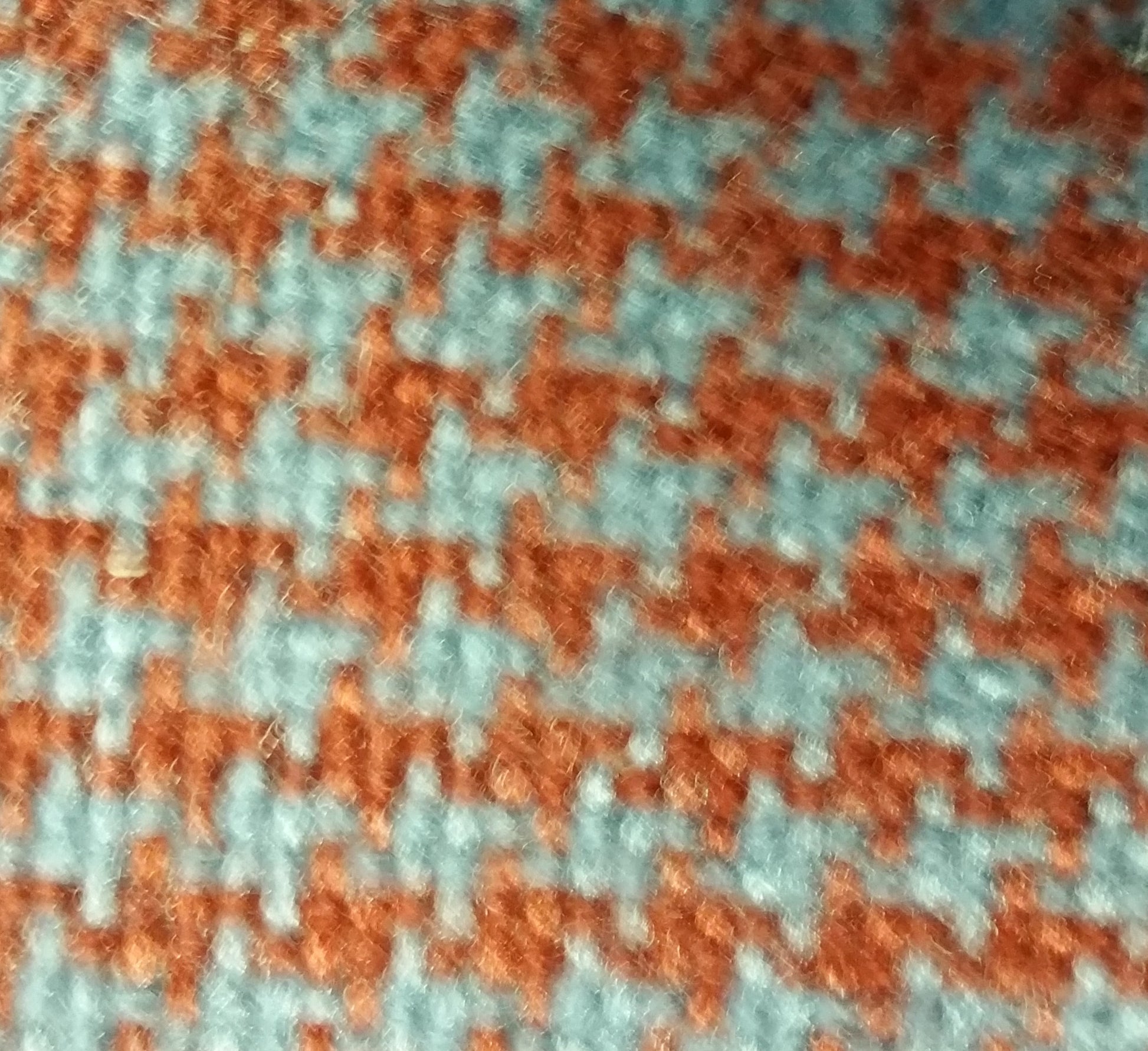 Rust blue houndstooth fabric swatch