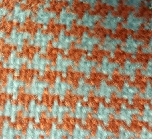 Rust blue houndstooth fabric swatch