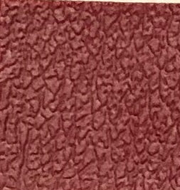 T72 Candy Apple Premier Contract Vinyl: textured, deep red vinyl flooring sample.