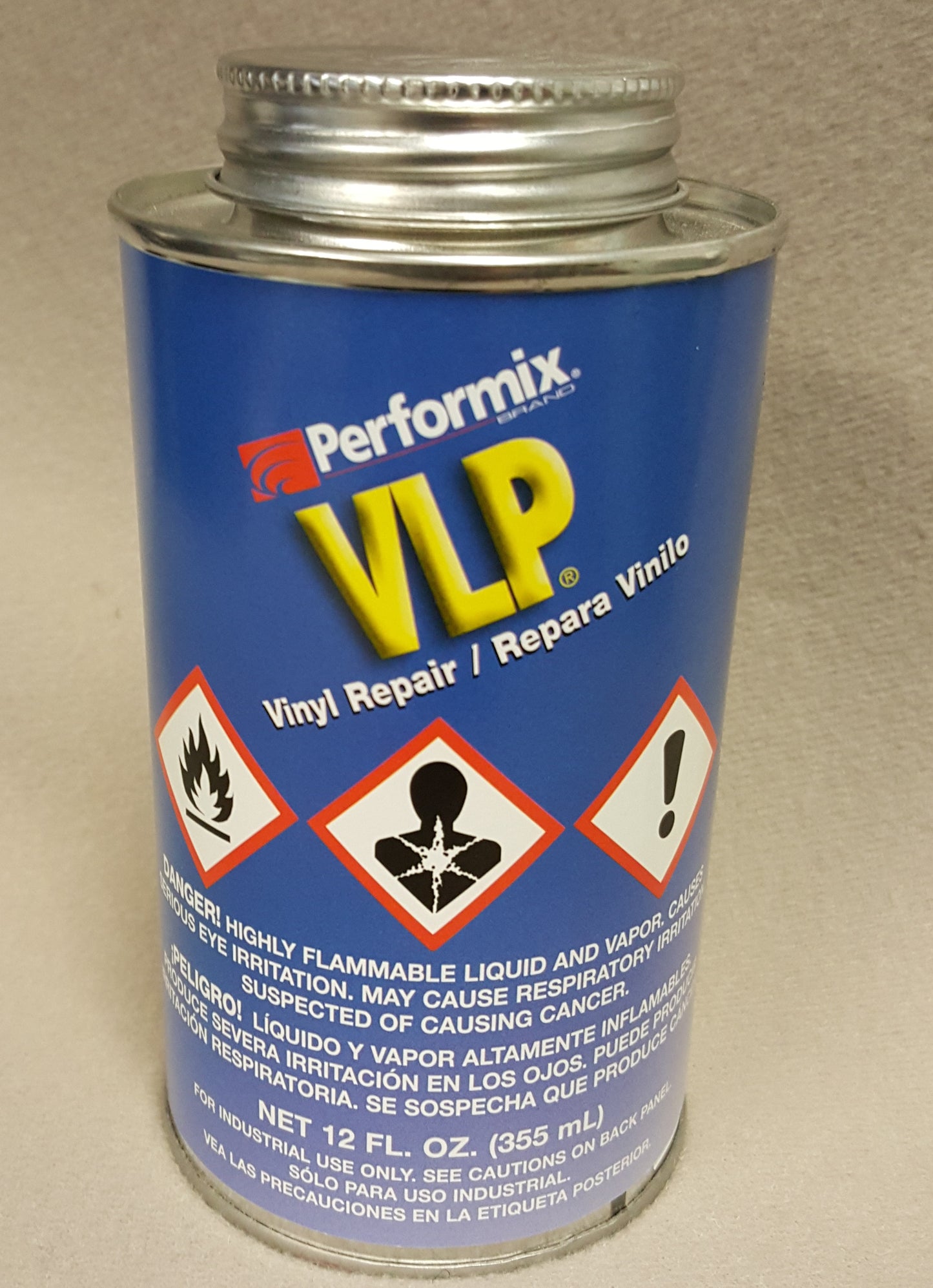 Performix Brand VLP 12 oz Vinyl Repair Adhesive in blue can with silver lid.