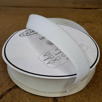 25-yard roll of 2" wide white sew-on hook-and-loop fastener.
