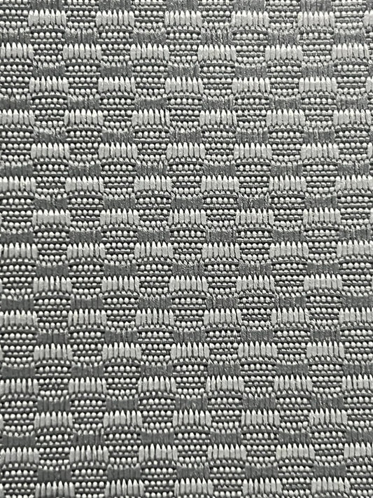 Tread Dark Ash 14.14213 fabric swatch: grey and white textured weave.